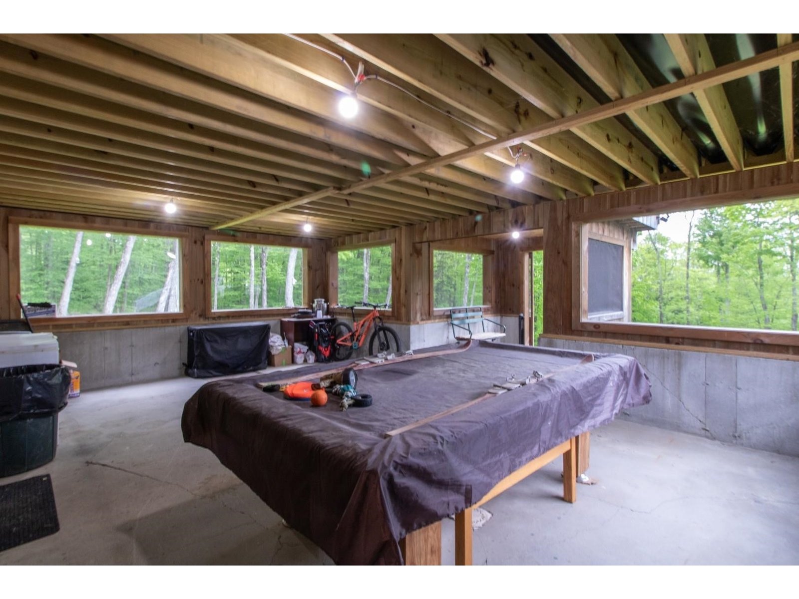 Covered, screened in area from walkout basement