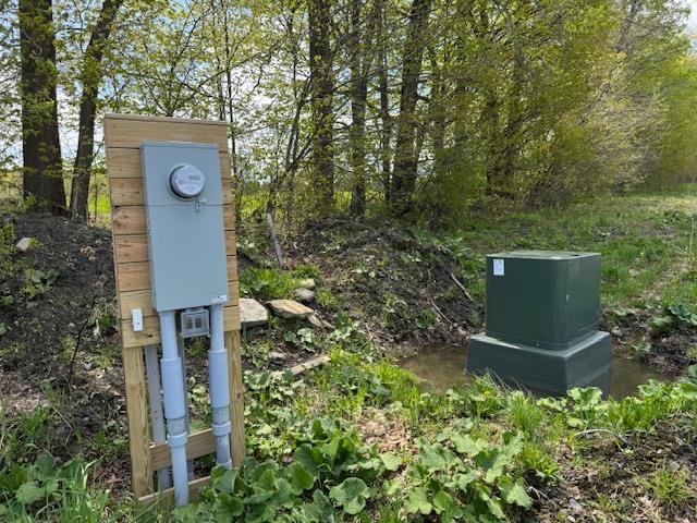 Buried power, transformer and meter installed.