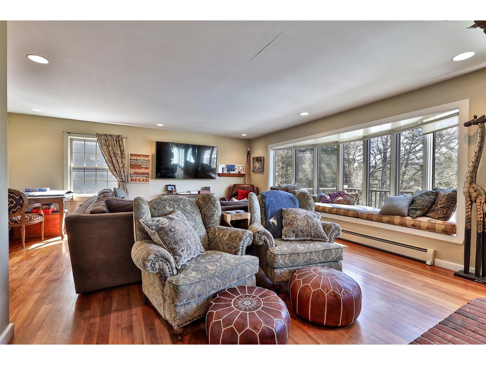 Large living room with window seat