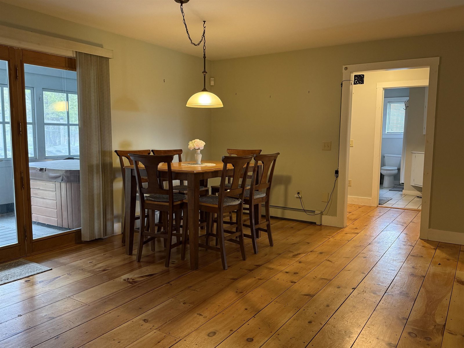 dining room opens to 3 seasons porch