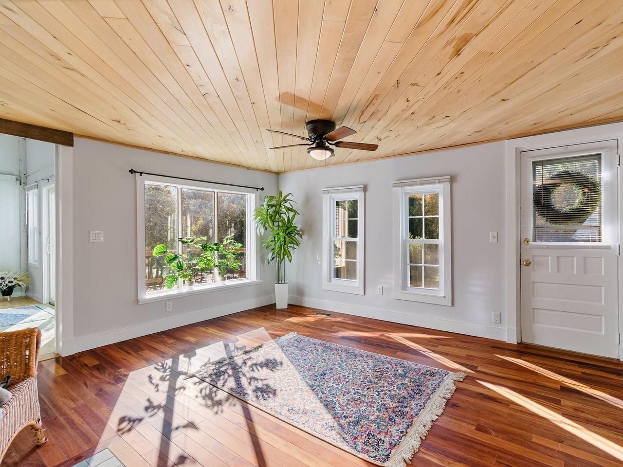 Living room w/planked ceiling