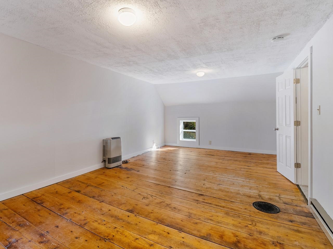 Unit 2 bedroom w/wood floors