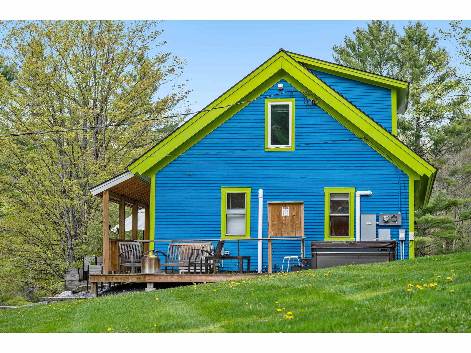 South Exterior with deck & hot tub