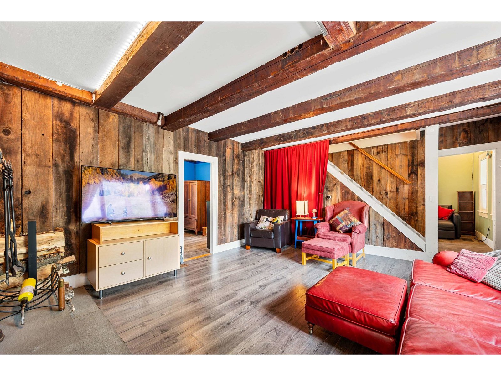 Living Room with hand cut old timbers!