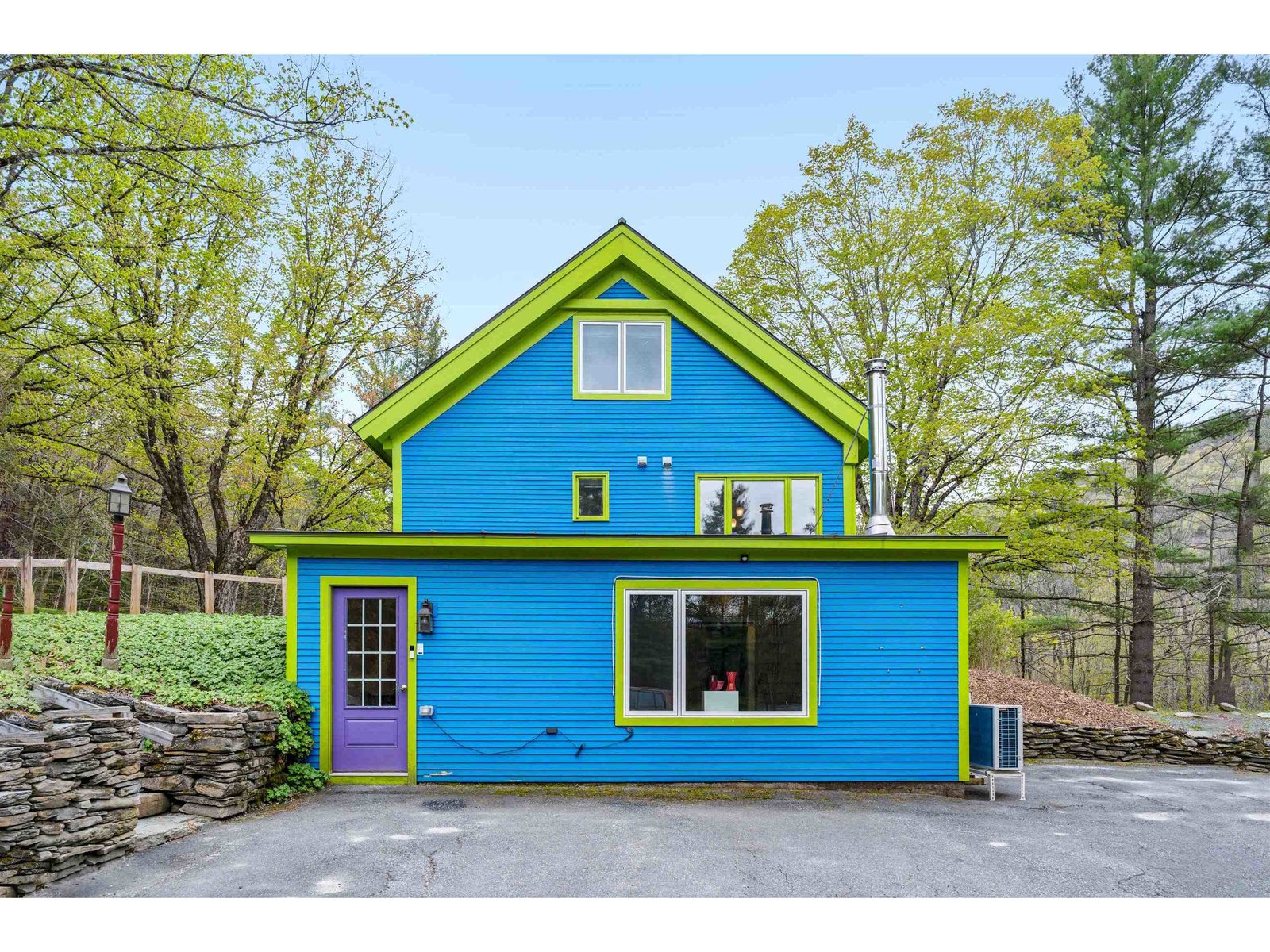 Paved parking area & Yoga studio entrance
