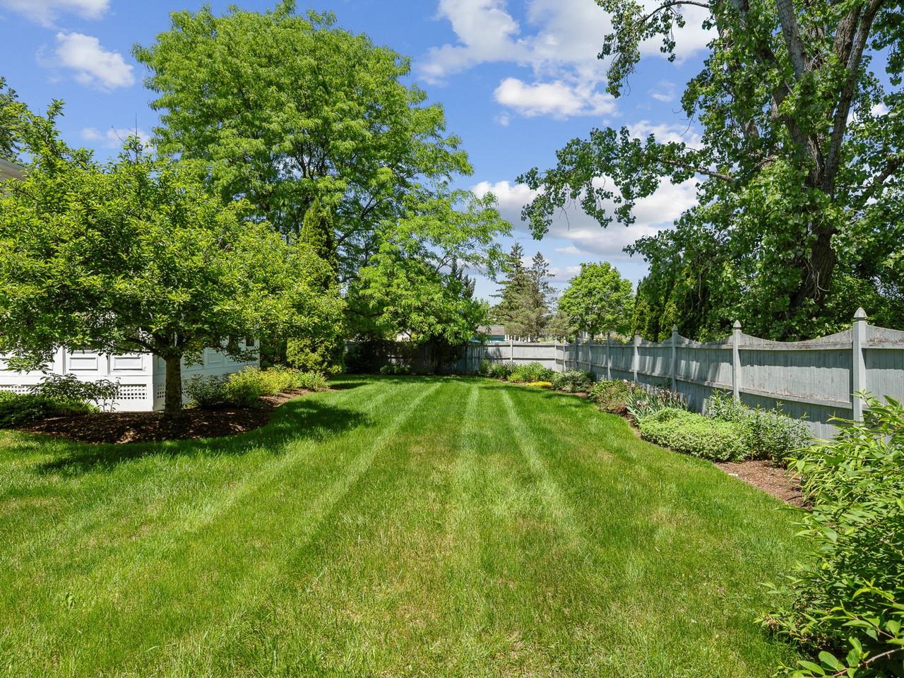 Private fenced backyard