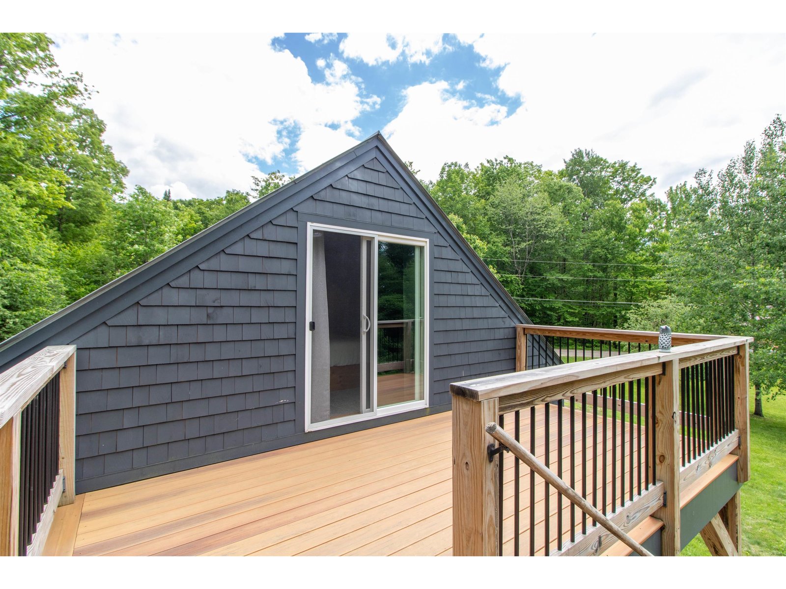 Deck With sliders off the 2nd floor primary BR