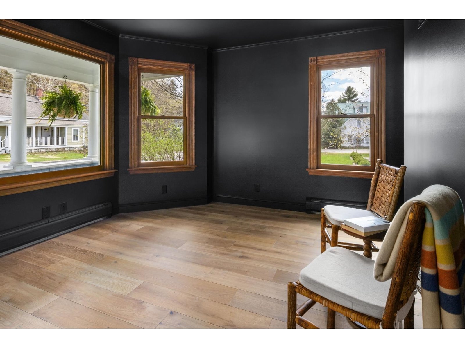 A room with large picture windows
