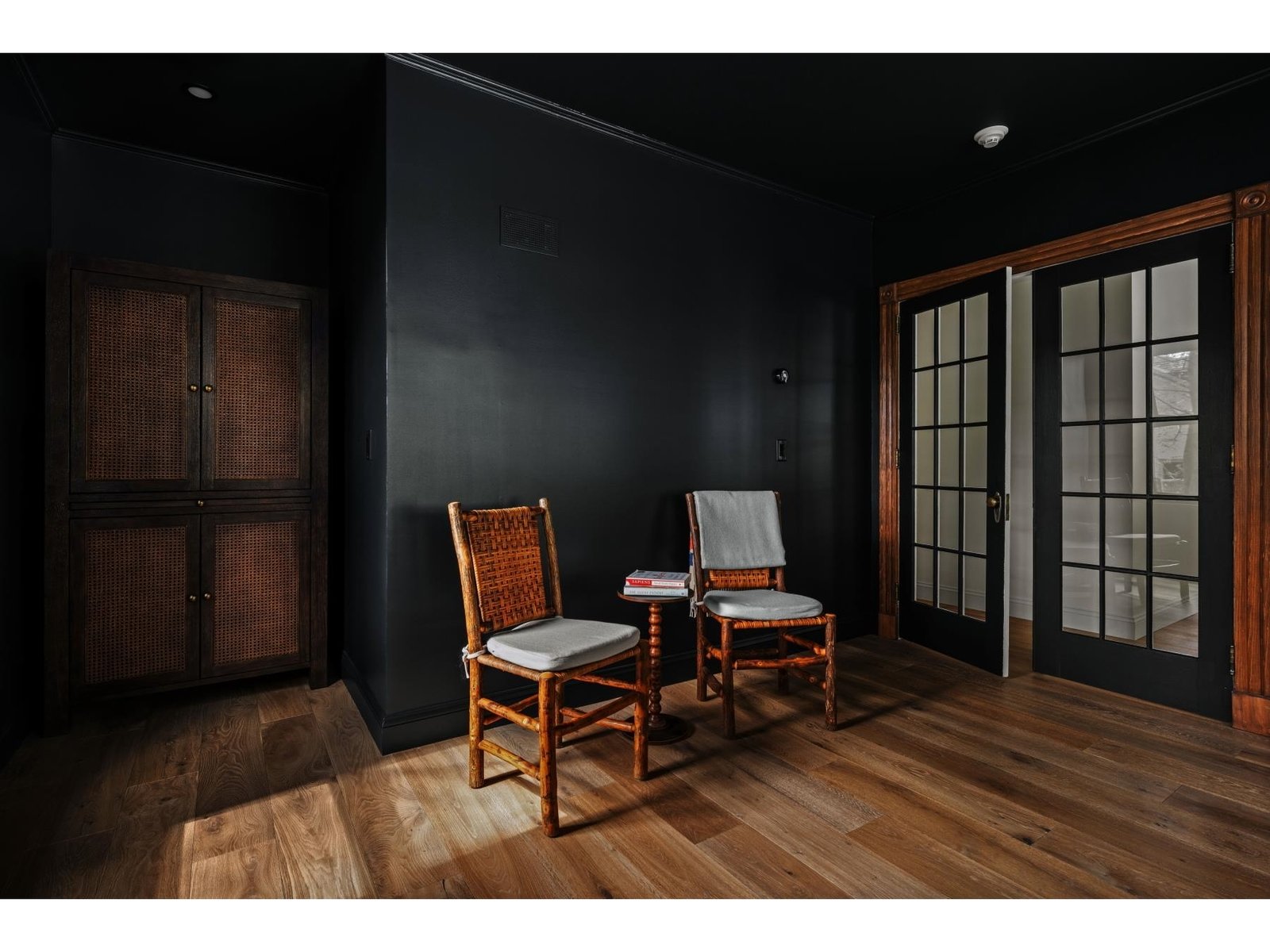 Darker colored wall with a splash of daylight