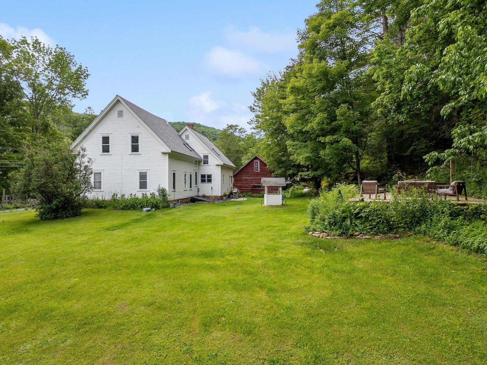 Deck & Farmhouse from lawn
