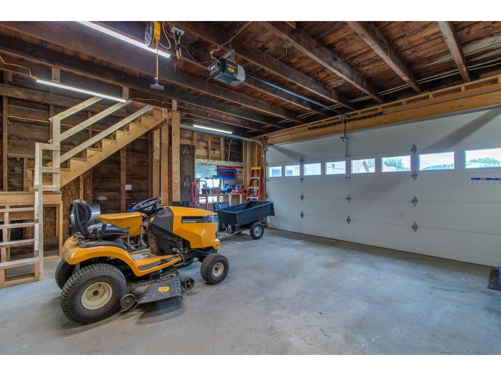 New concrete, stairs, 16' door