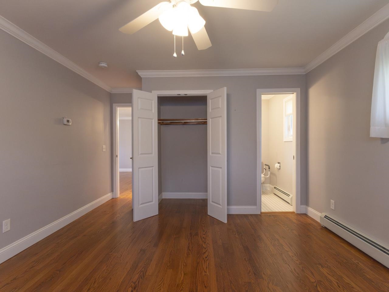Hardwood Bedroom with Closet