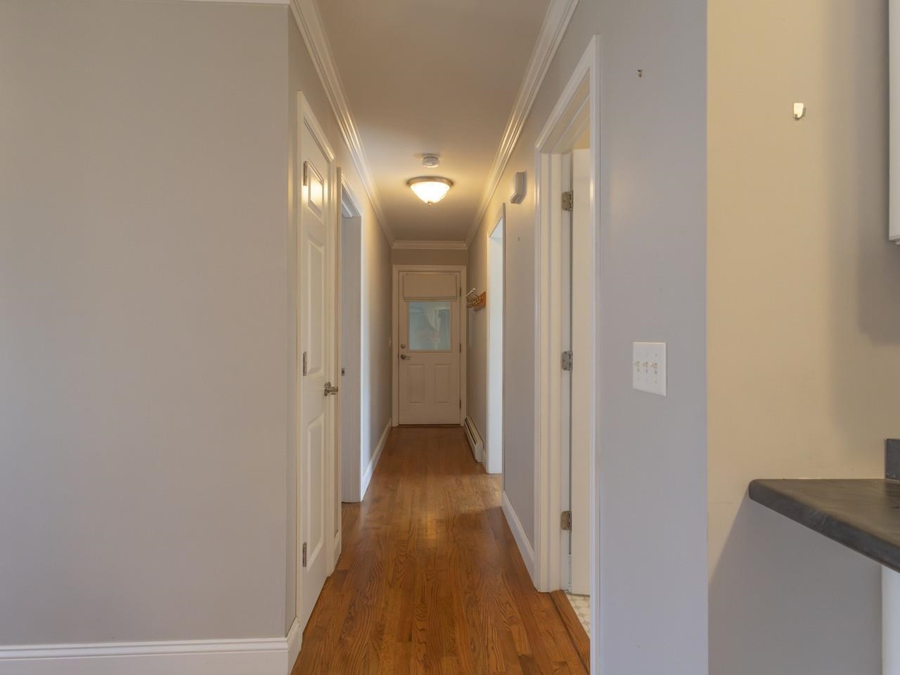 Inviting Hardwood Hallway