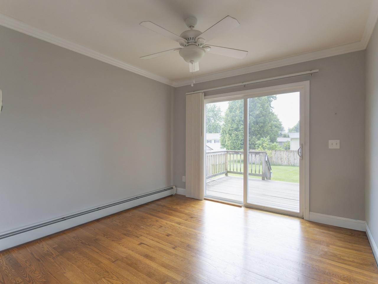 Hardwood Room with Patio