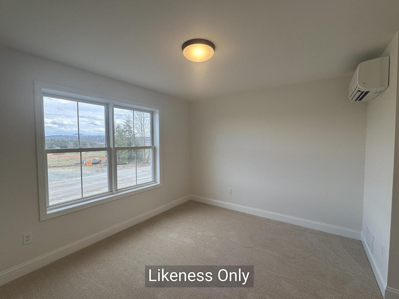 Bedroom with Wide Window View