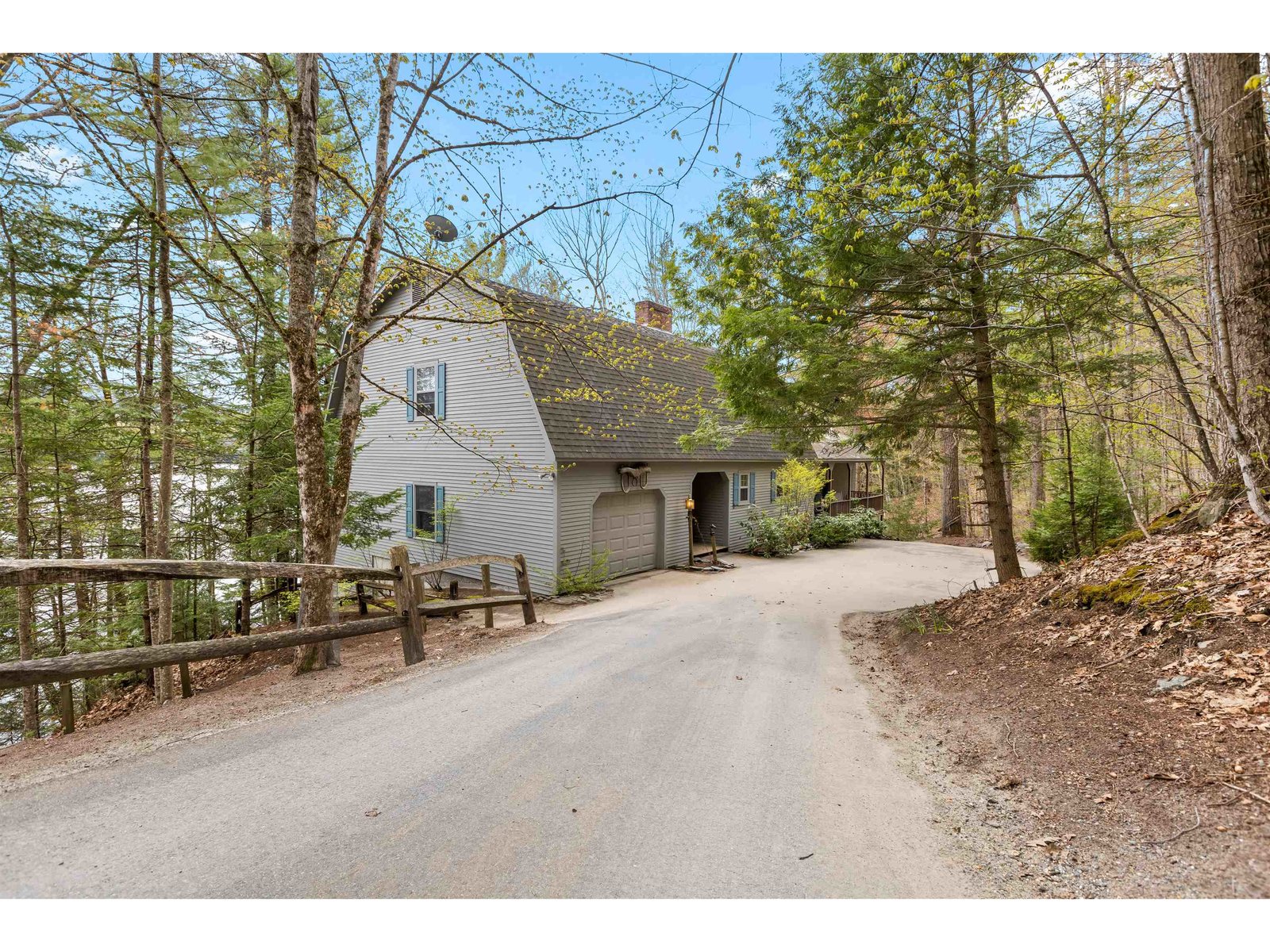 Attached one car garage, asphalt drive