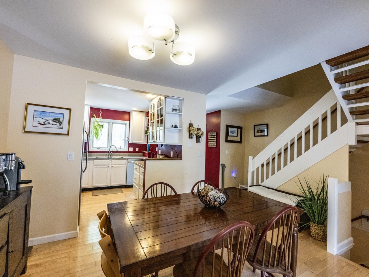 Kitchen opens to dining area