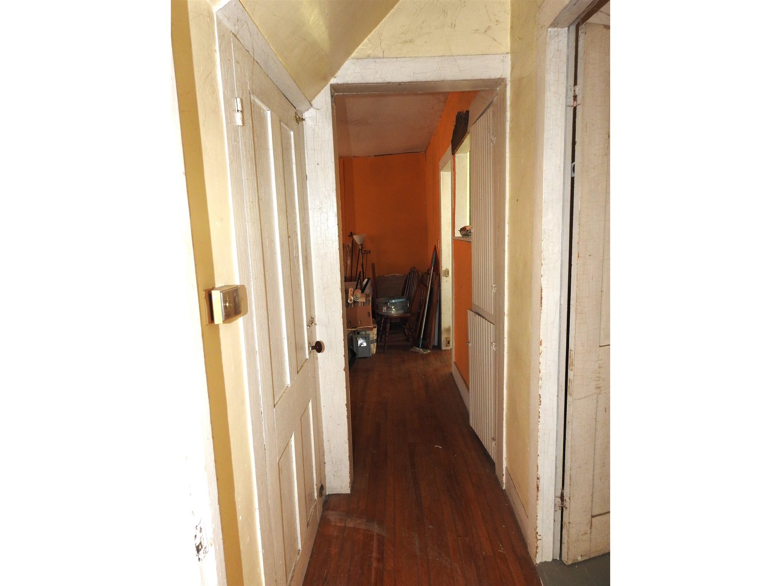 Rear Hallway- Basement on left with Bathroom on right