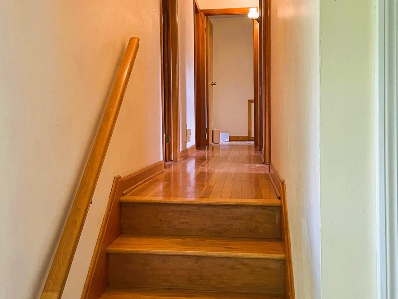 Wood stairway to 2nd level
