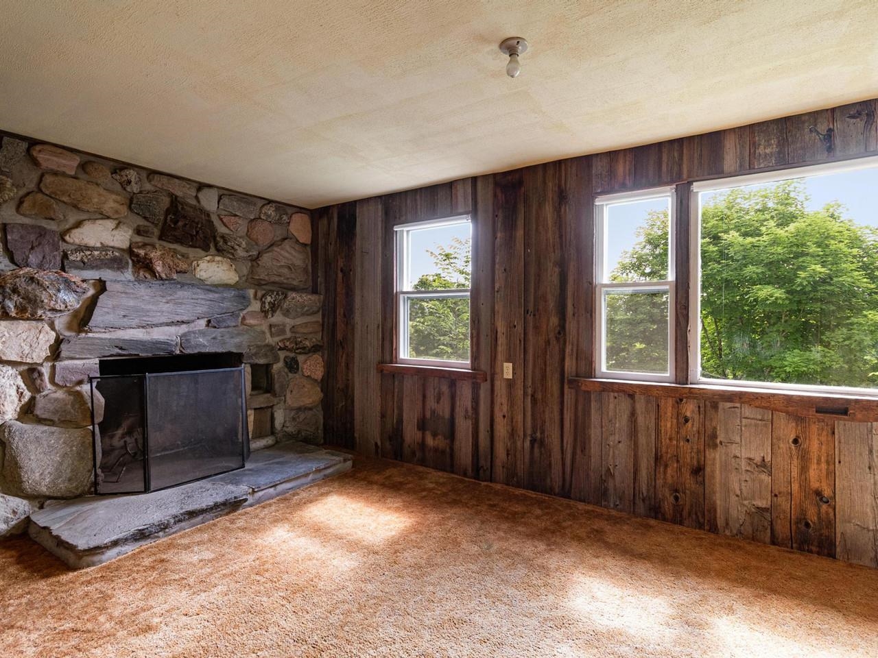 Fieldstone fireplace & stove