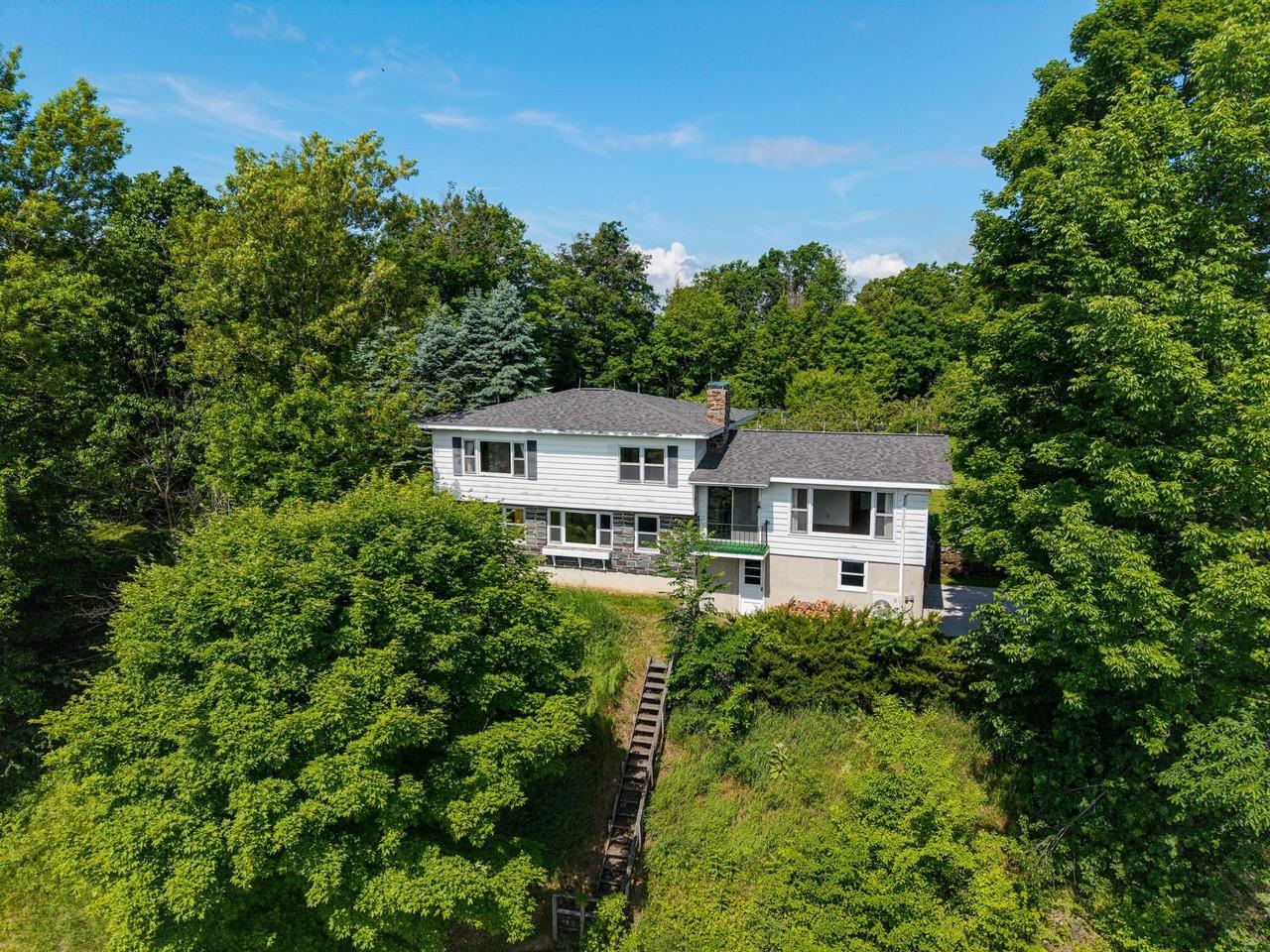 House perched on elevated site