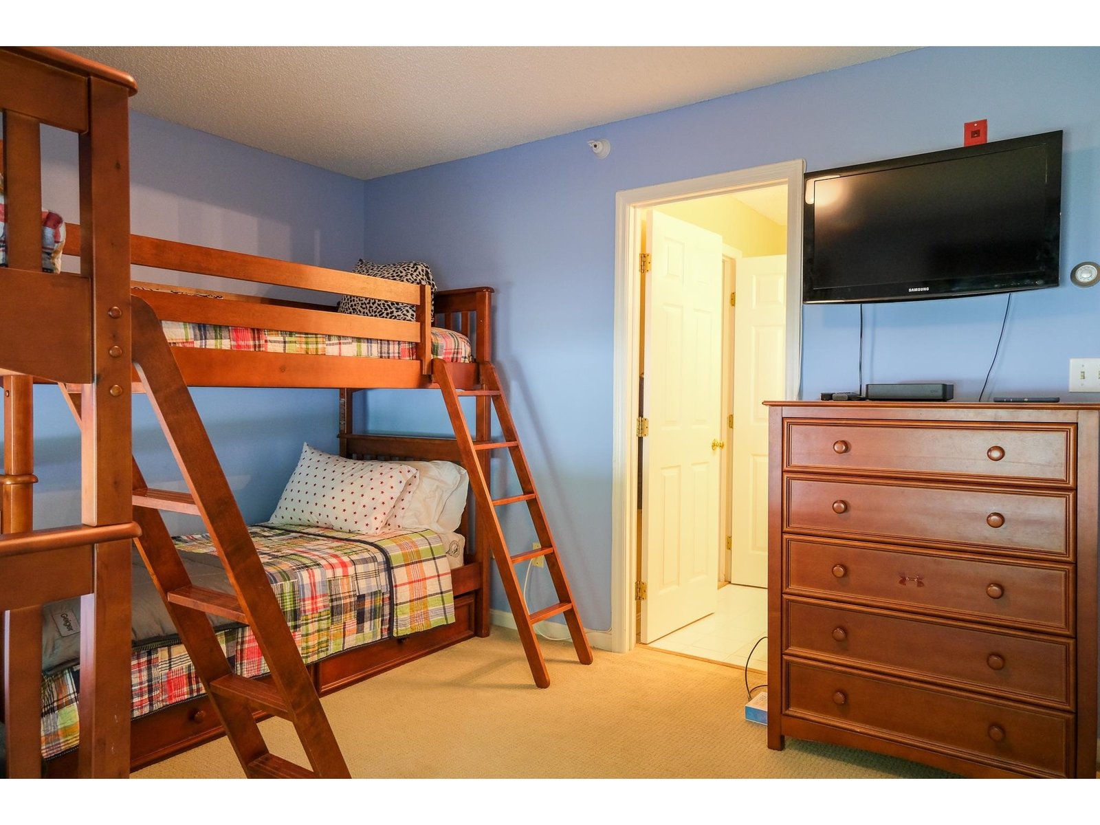Bunk room with bathroom