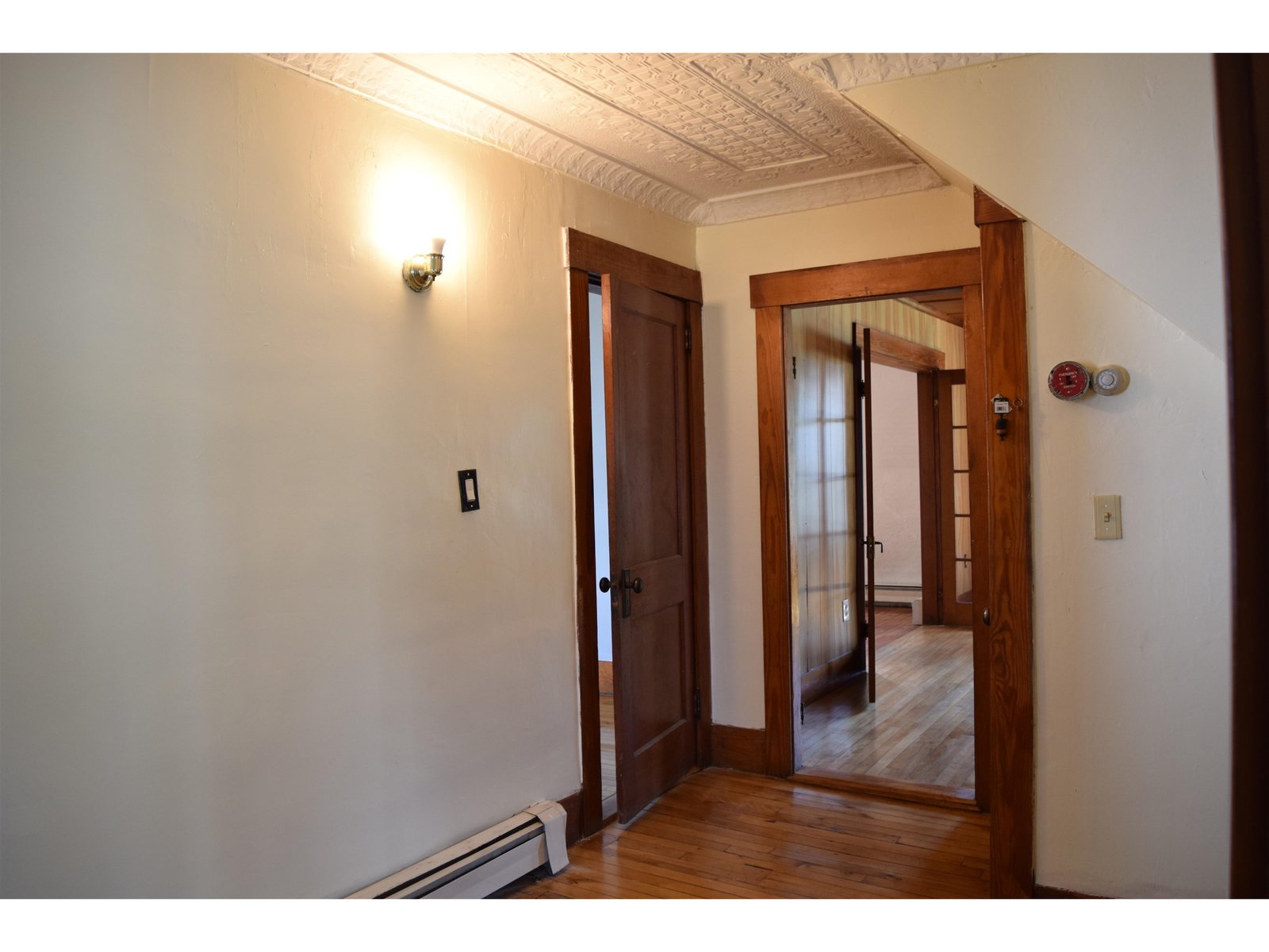 1st floor entrance with tin ceilings