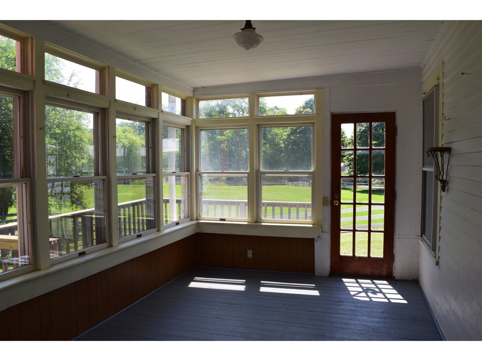 Enclosed back porch on first floor