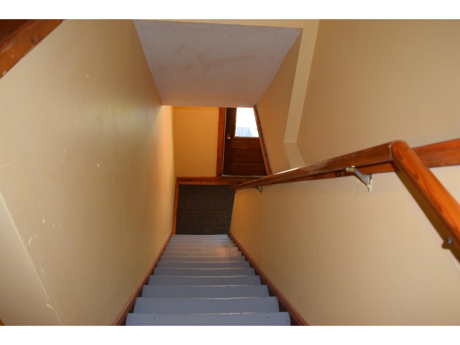 Stairs between second and first floors