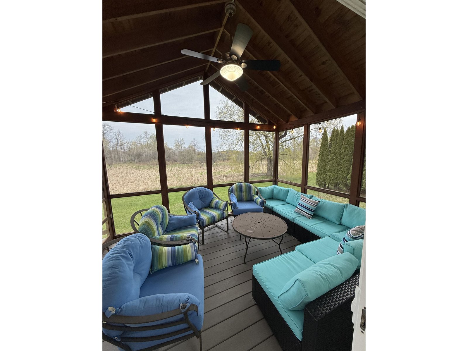 SCREENED IN PORCH OFF KITCHEN AND LIVING ROOM