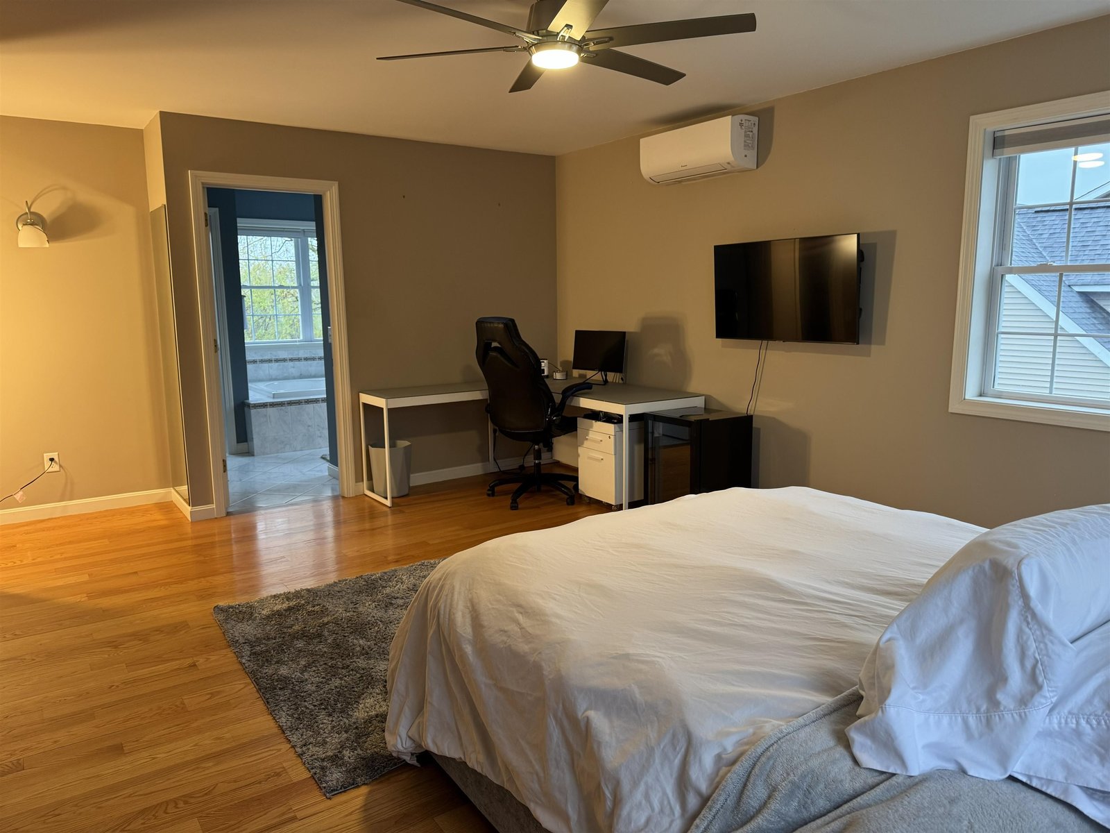 PRIMARY BEDROOM W/ WALK-IN CLOSET & EN SUITE