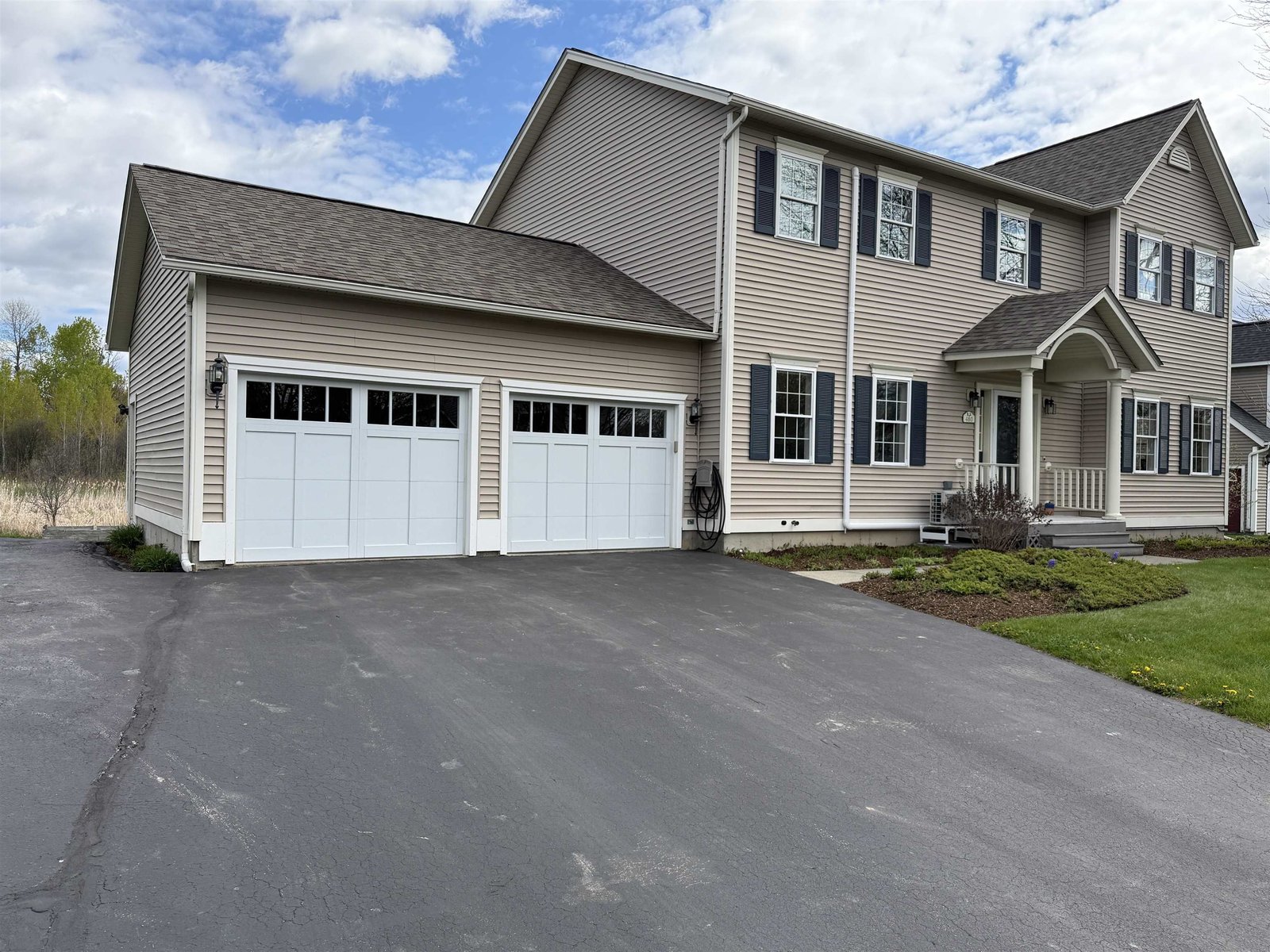 ASPHALT DRIVEWAY WITH ROOM FOR THE BOAT