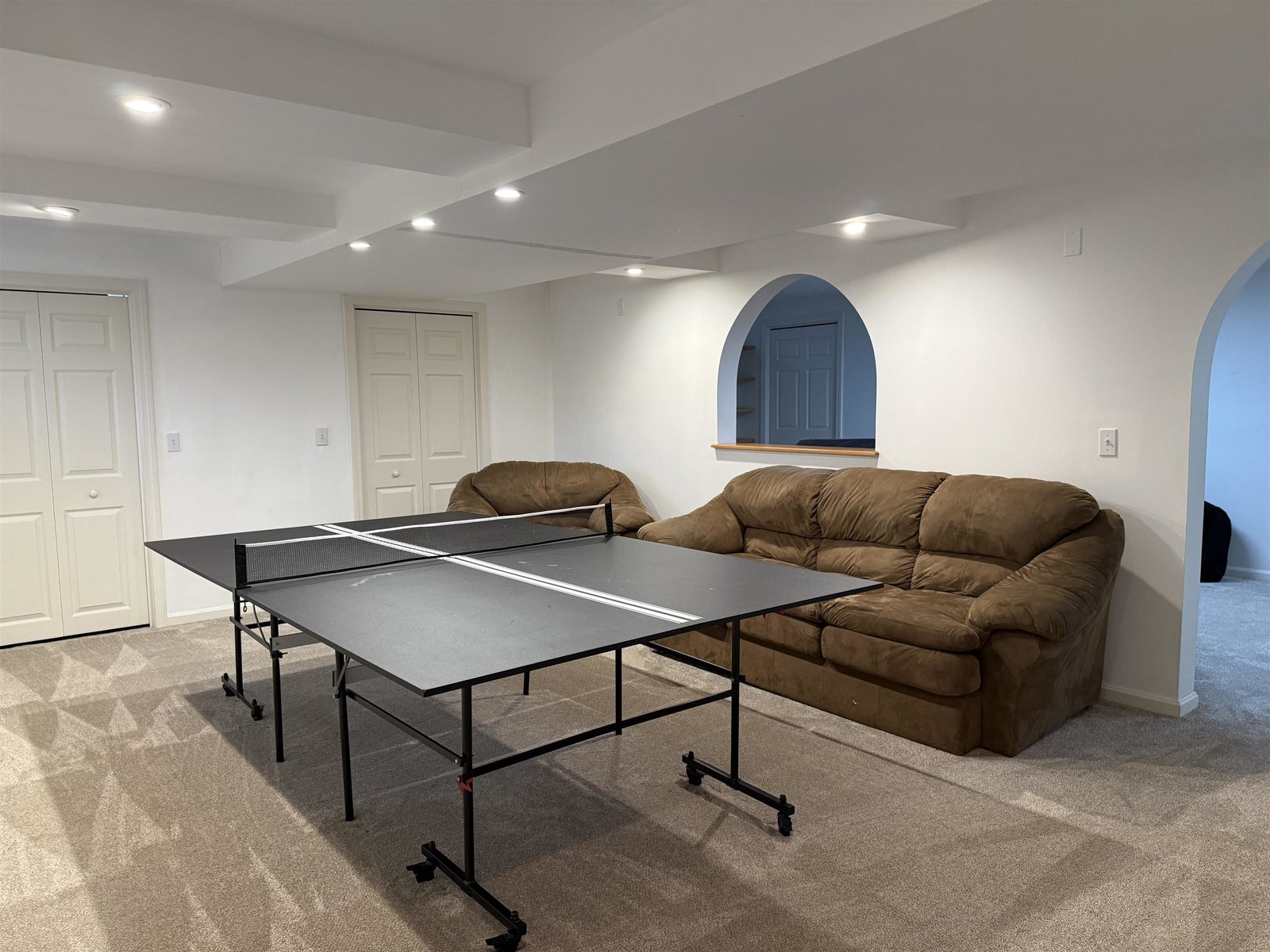 GAME ROOM IN THE BASEMENT W/ NEW CARPET