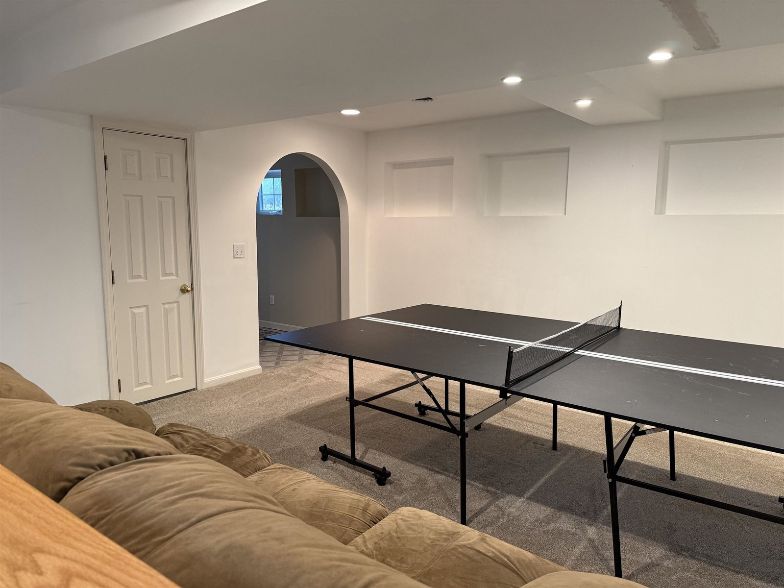 BASEMENT GAME ROOM W/ ENTRANCE FROM GARAGE