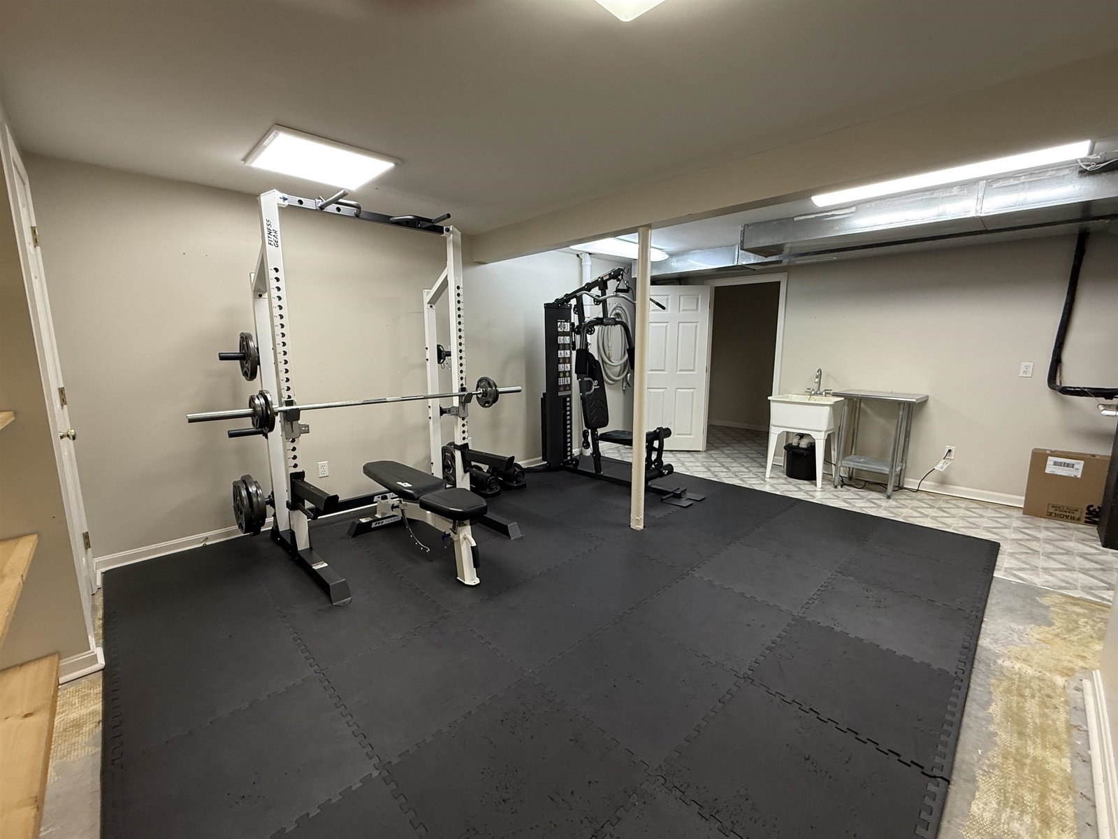 WORKOUT ROOM IN BASEMENT AREA