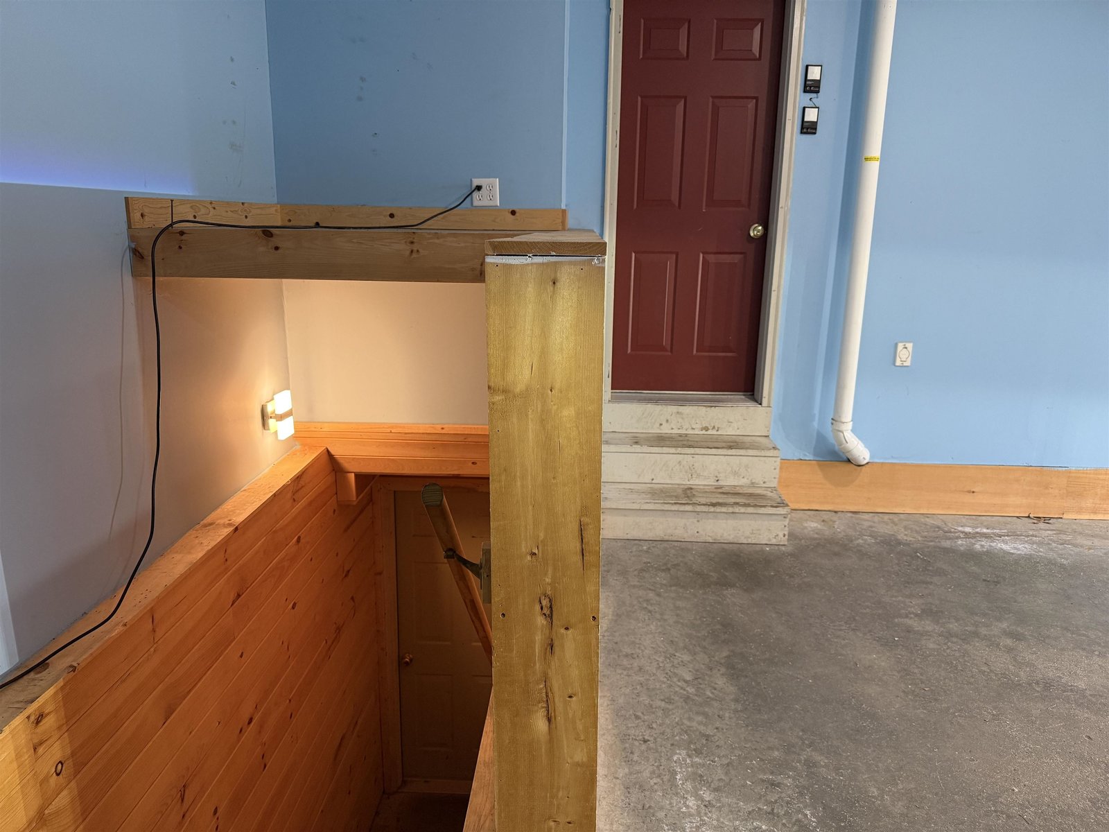 GARAGE ENTRANCE TO MAIN LEVEL & BASEMENT