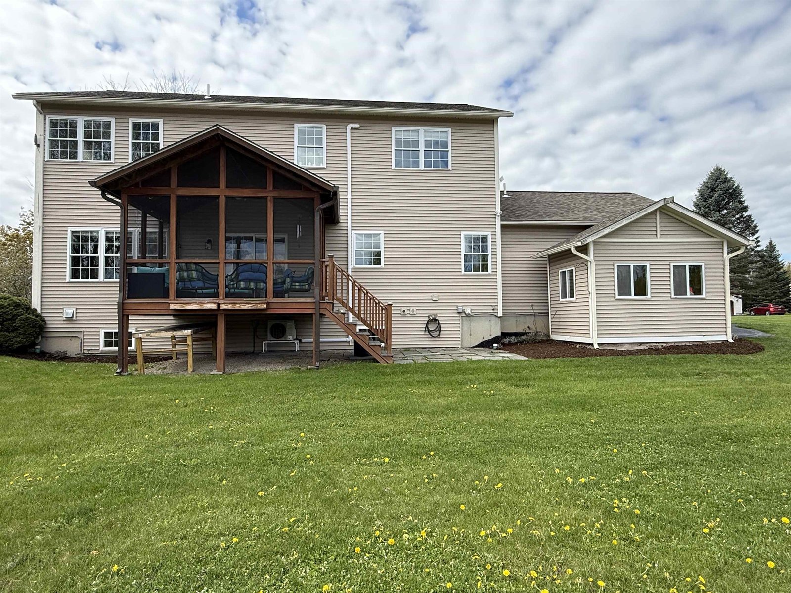 BACK YARD FACING SCREENED IN PORCH AREA