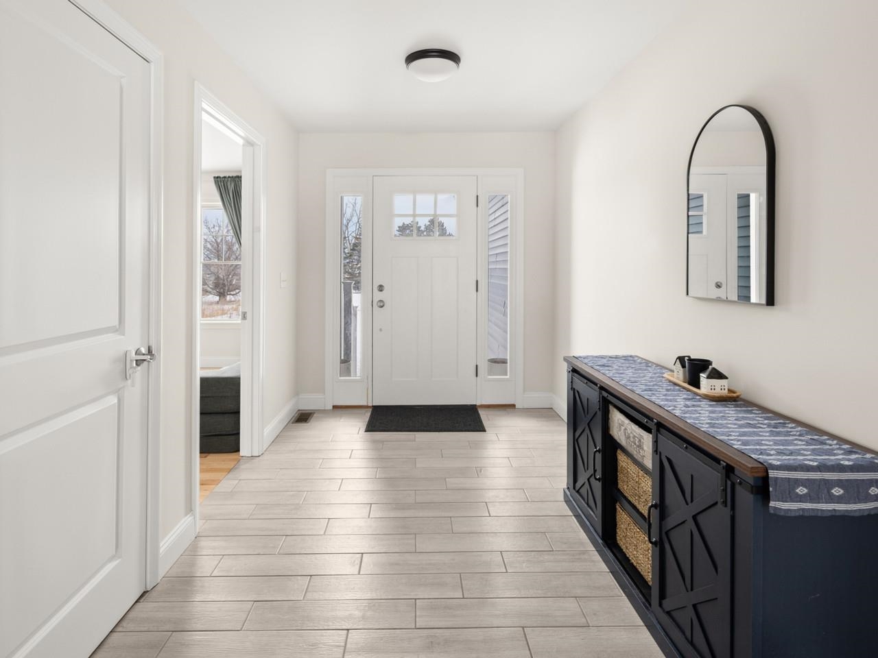 Entryway with large front door