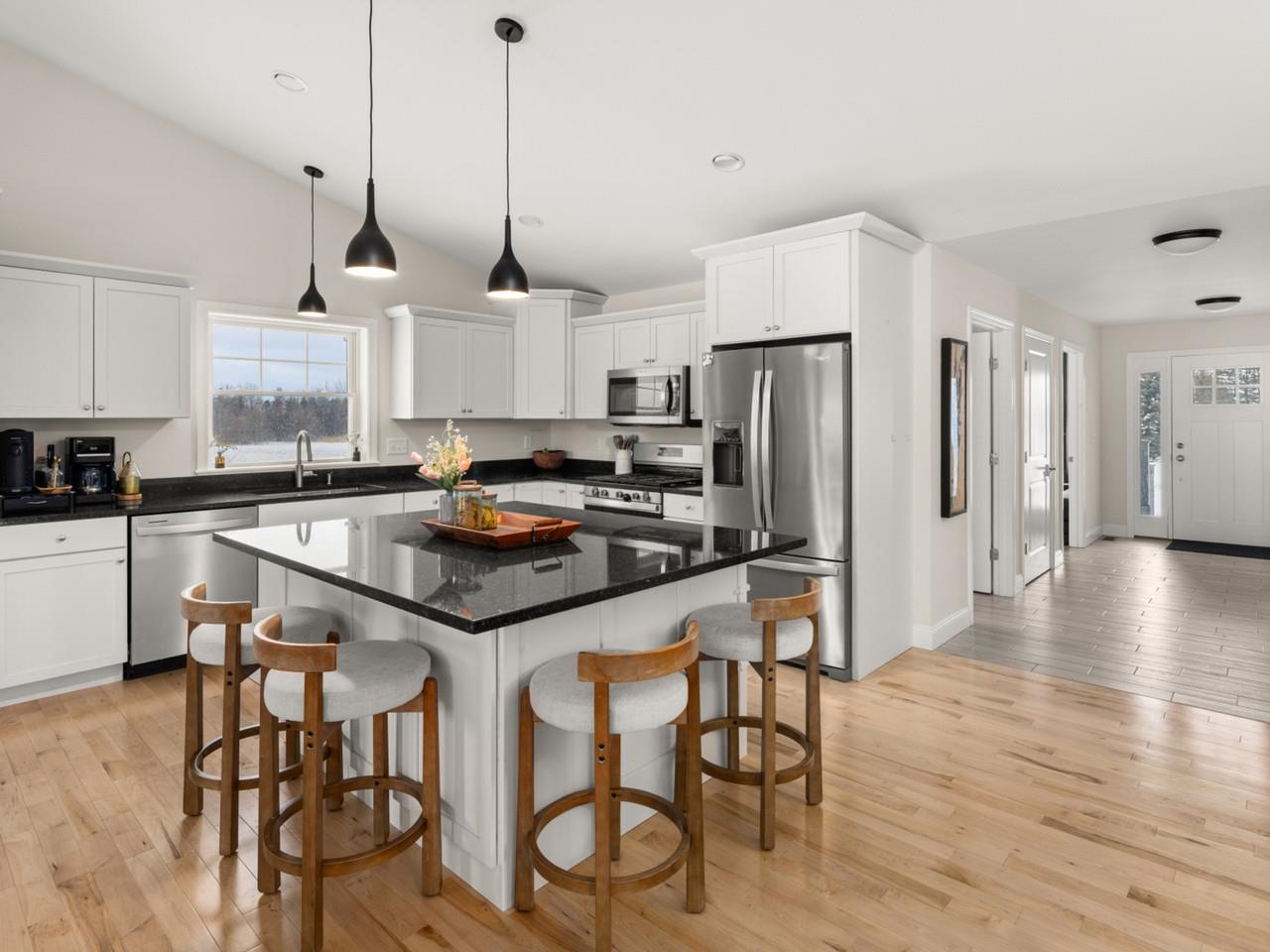 Kitchen with island and stools