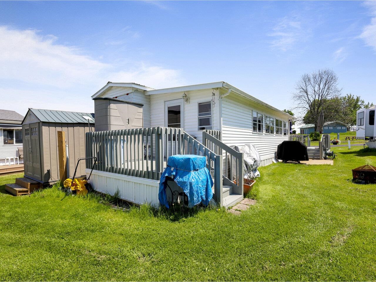 Large storage shed included