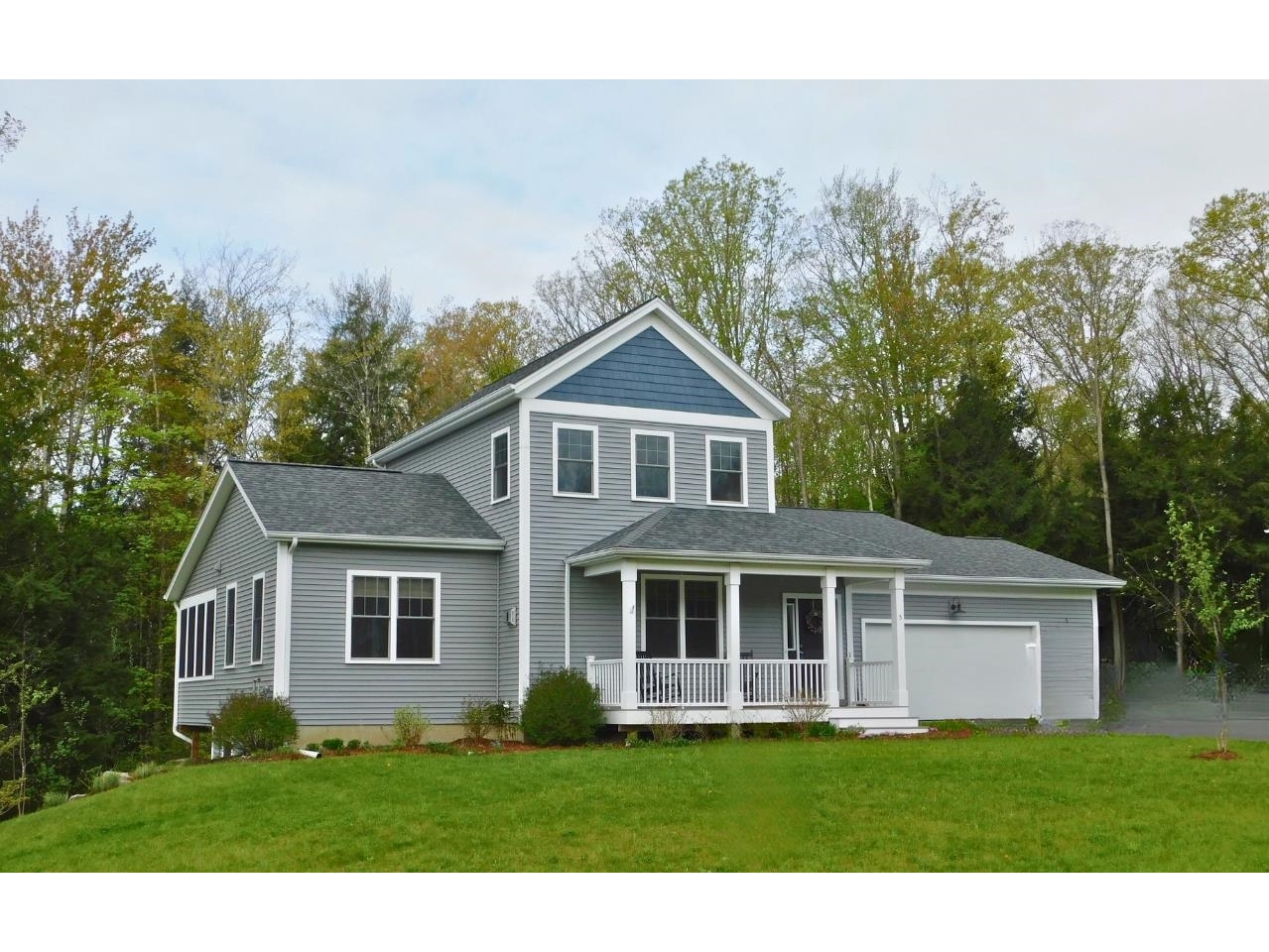 Hillside location for this lovely Contemporary