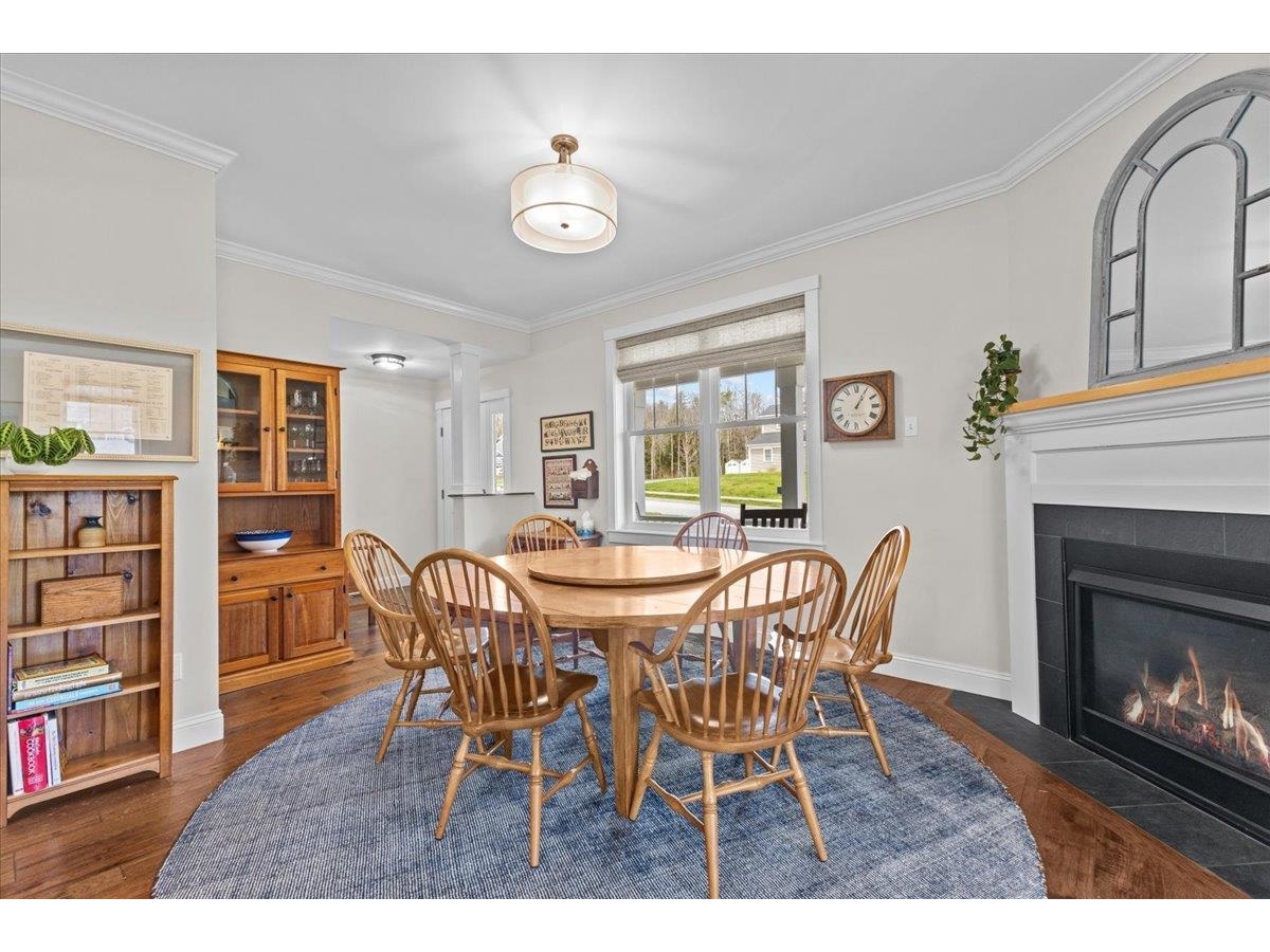 Formal dining with gas fireplace.