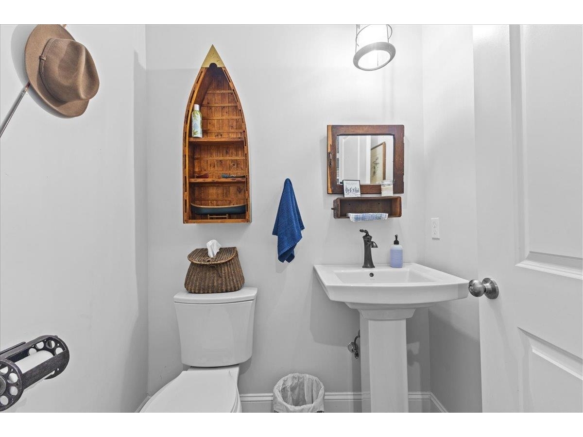 Mudroom with built-ins and access to the garage.