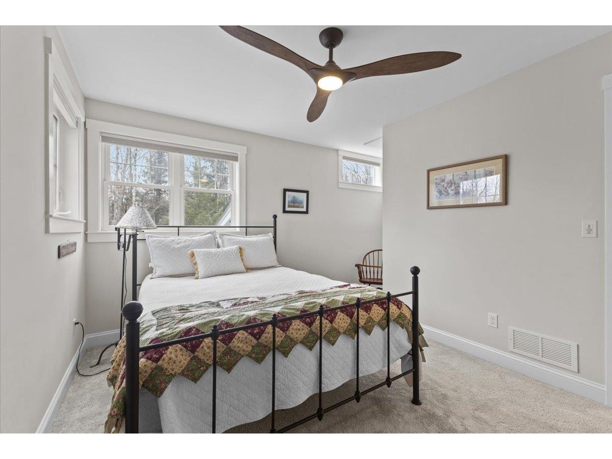 Another 2nd floor bedroom with transom window.