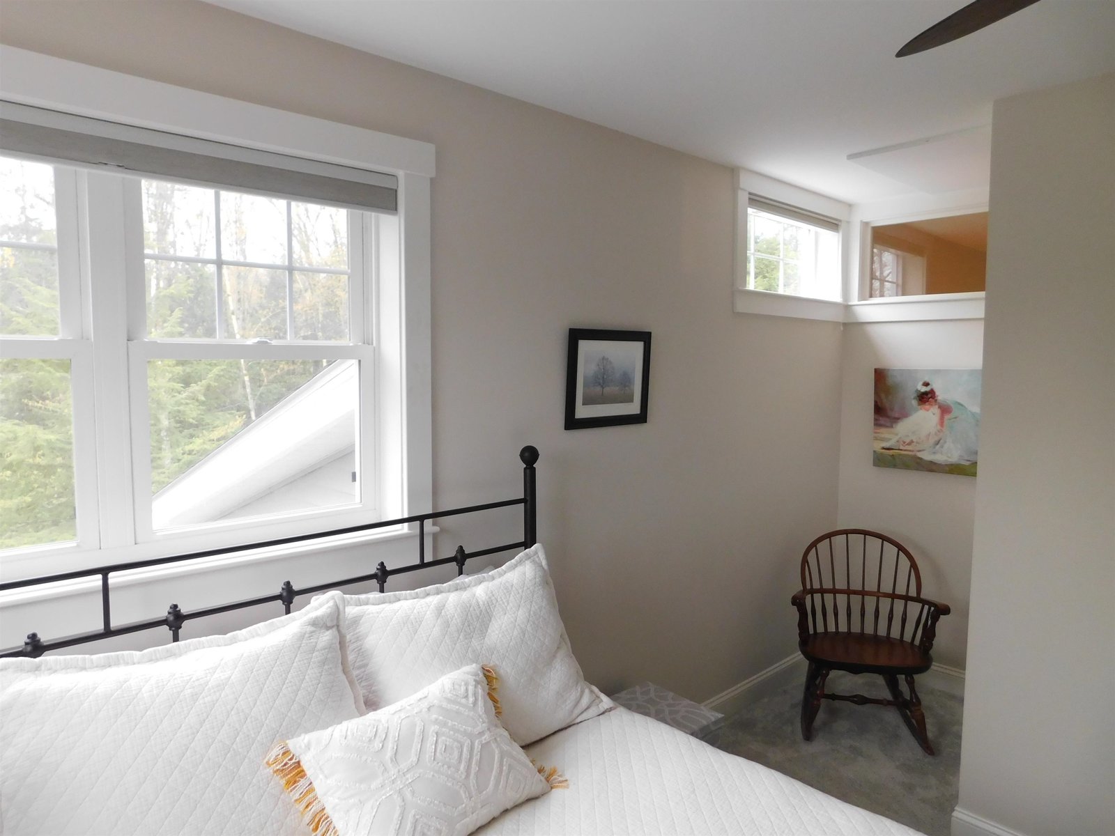 Upper level Bedroom with transom window.