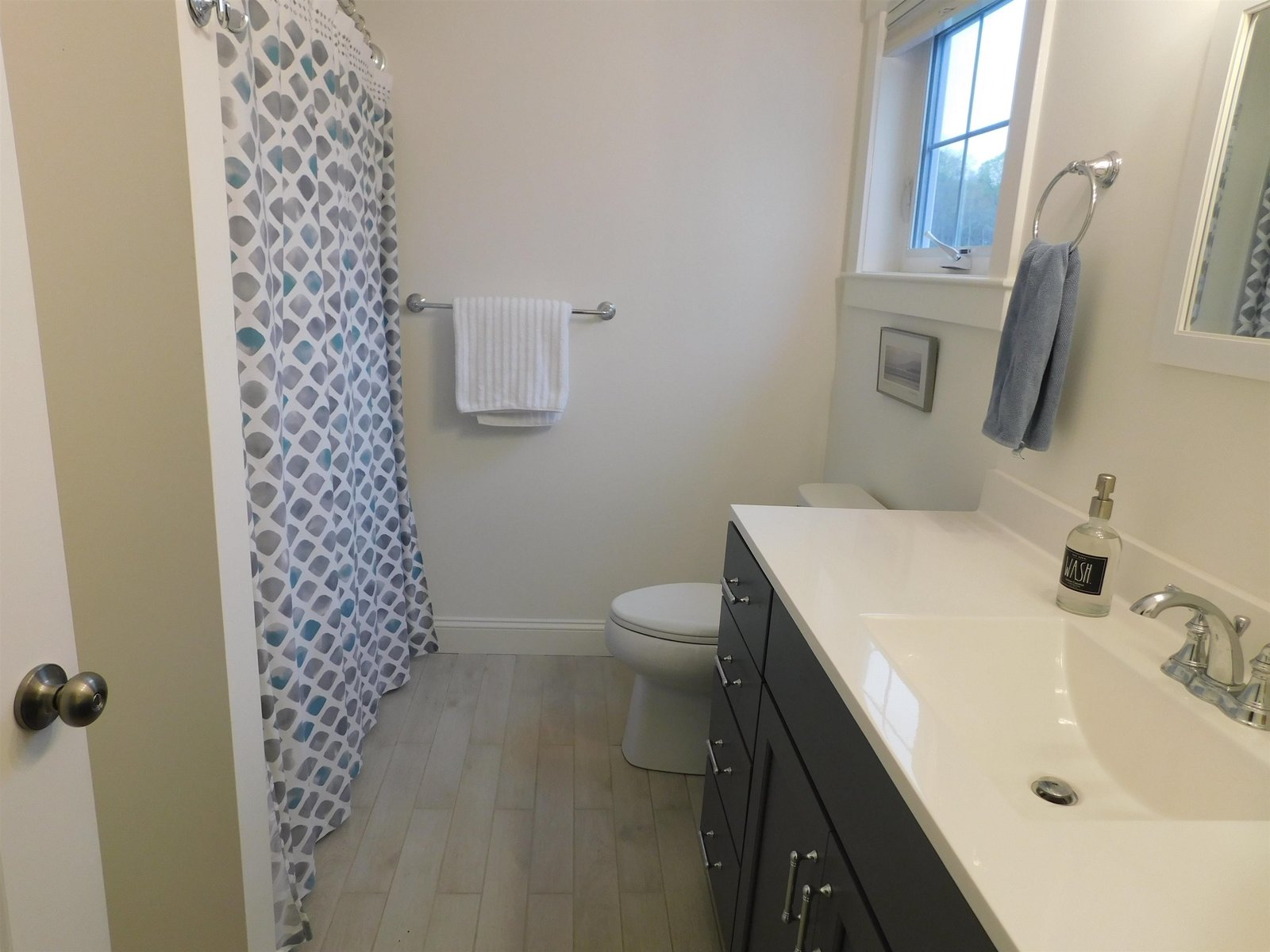 Sitting nook with transom window feature.