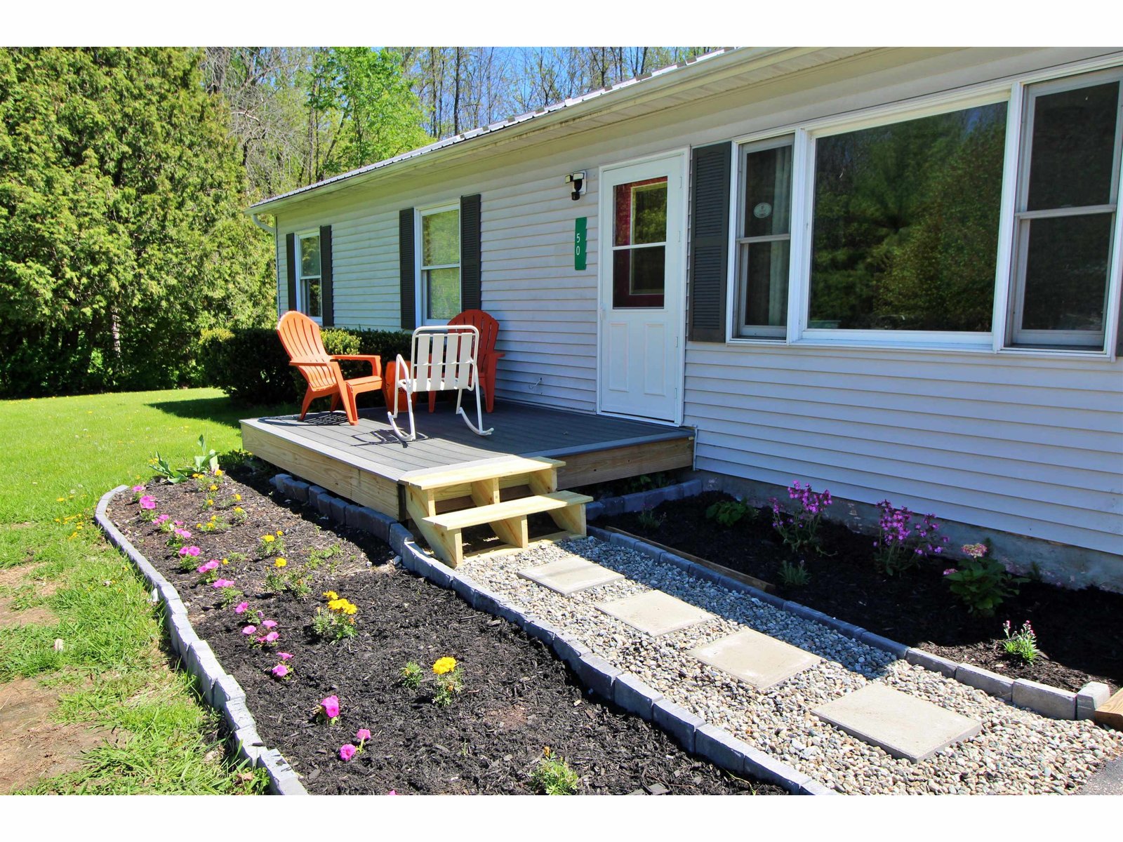 New deck, pavers, fresh flowers