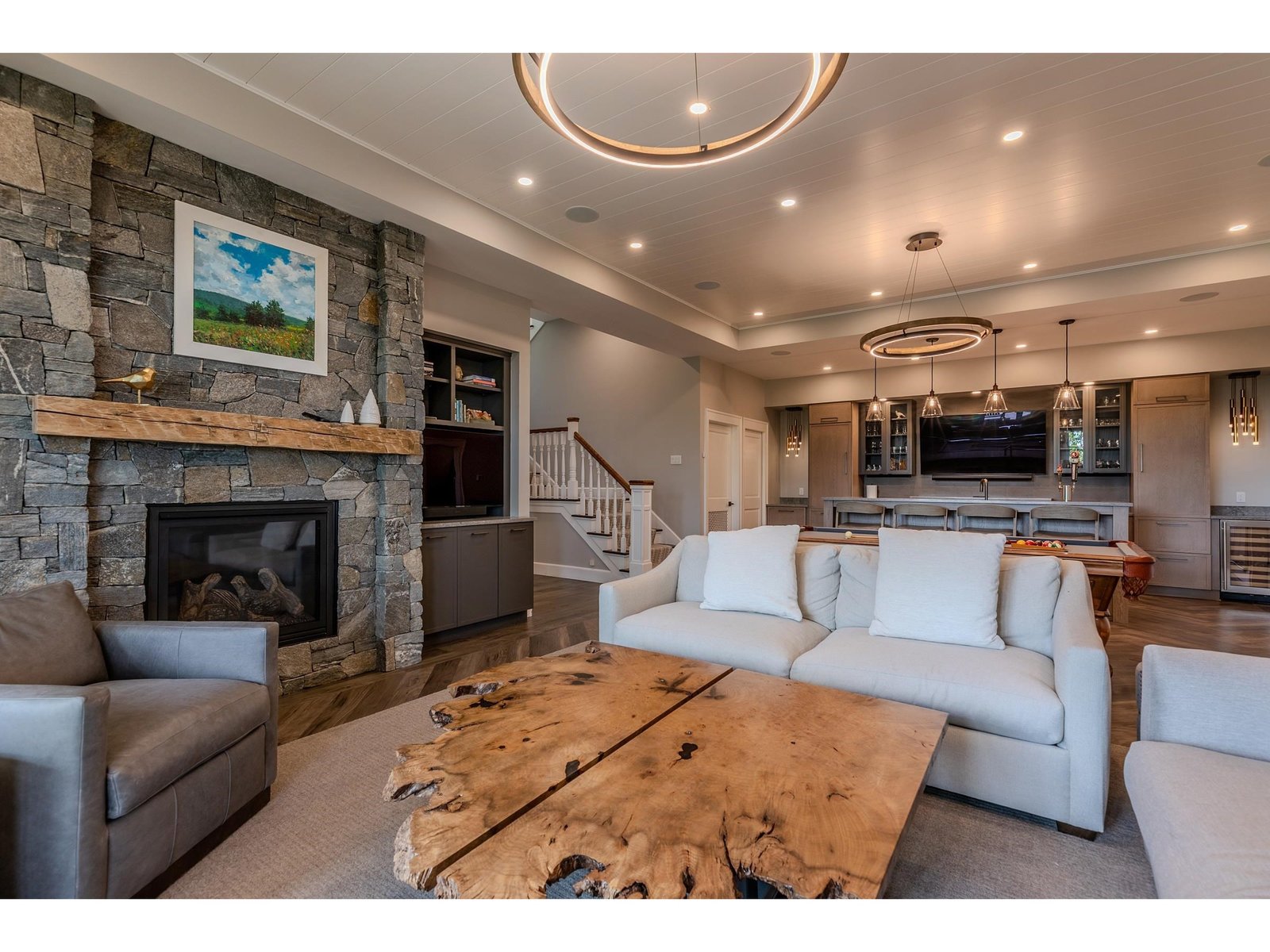 Spectacular lower living area w/ fireplace