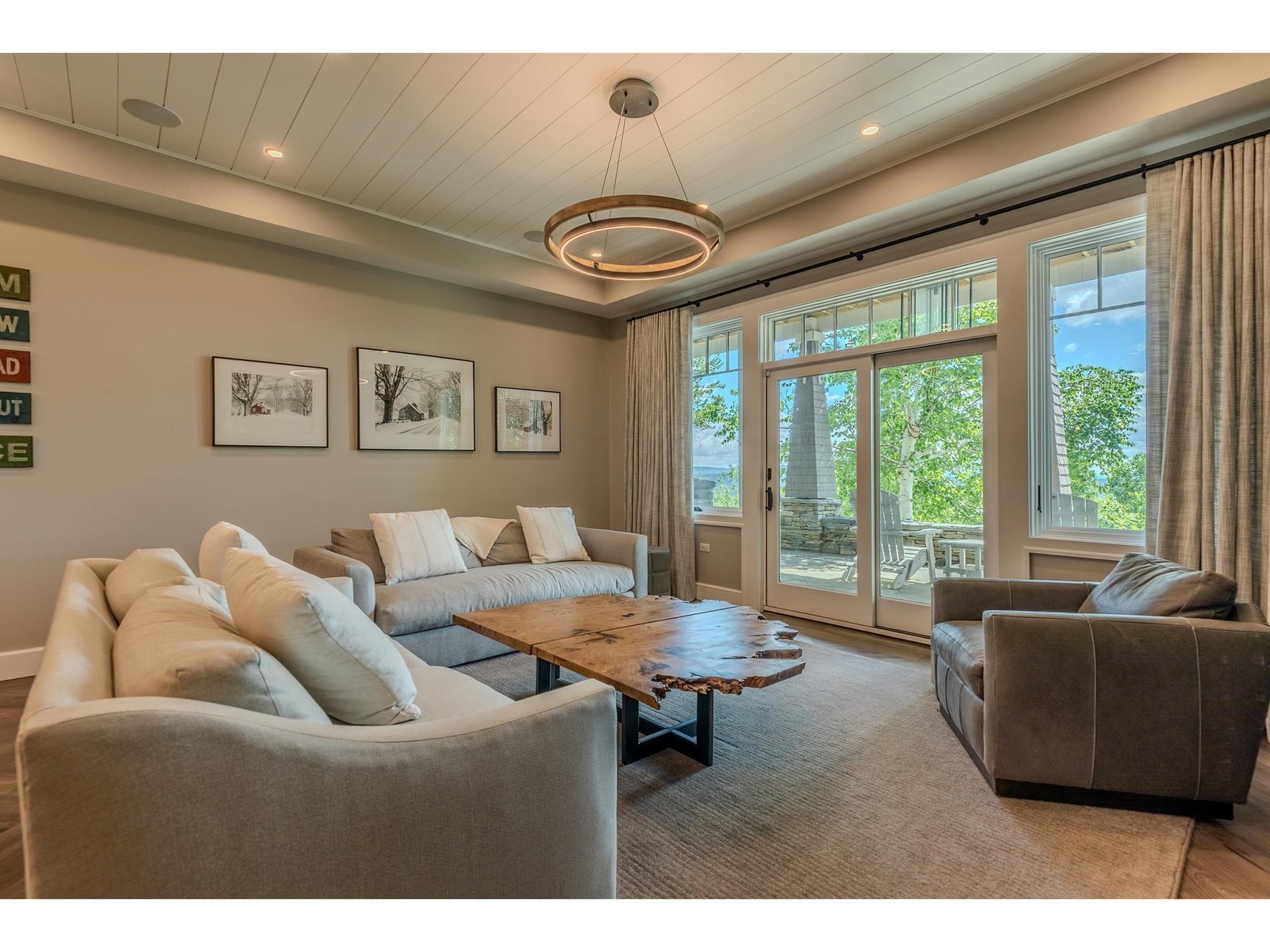 Lower living w/ French door to patio and hot tub
