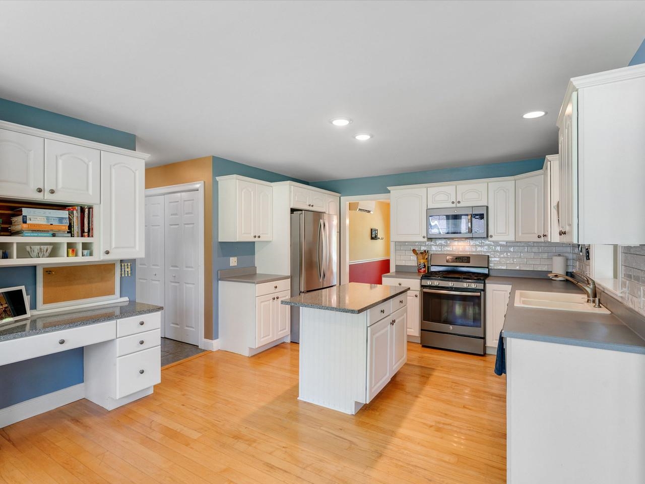 Hardwood, tiled backsplash